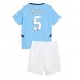 Manchester City John Stones #5 Hjemmedraktsett Barn 2024-25 Korte ermer (+ Korte bukser)